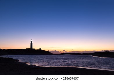 Beach at Lighthouse at Cape Trafalgar along the southern atlantic coast in spain - Shutterstock ID 218659657
