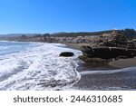 Beach of Los Pellines during low tide on Pacific ocean during summer (Maule region, Chile). 