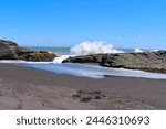 Beach of Los Pellines during low tide on Pacific ocean during summer (Maule region, Chile). 