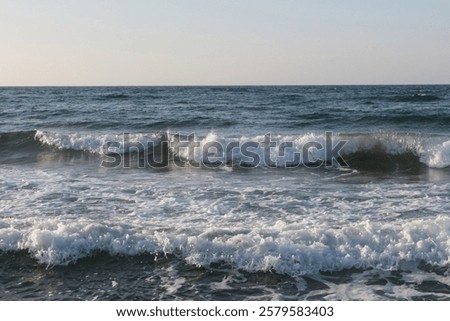 Similar – Image, Stock Photo Waves crashing on the rugged Praia Jalé shoreline