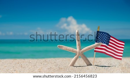 Beach, Ocean, Starfish, American flag. Summer vacations. Atlantic Ocean. Florida paradise. Sunny day. Beautiful Turquoise color of ocean salt water. Tropical nature. Seascape concept for travel agency