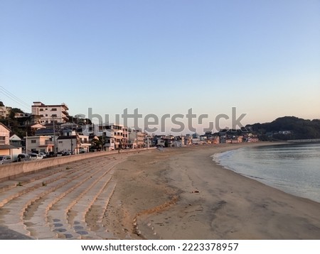 Evening view from above of the bay, the sandy beach and the old town of Sperlonga (southern Italy)