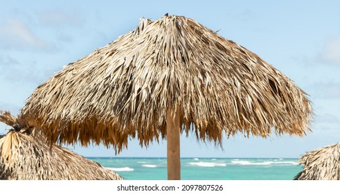 Beach Palapa, Beach Umbrella, And Caribbean Sea.