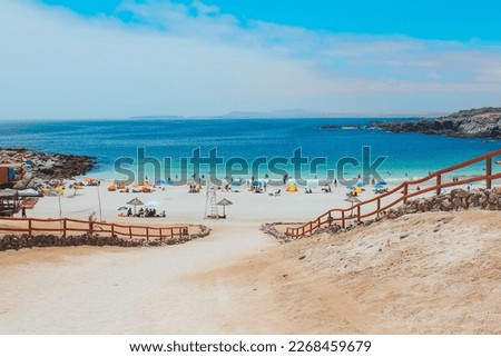 Beach path pacific ocean people enjoying the summer holidays Playa La Virgen Chile