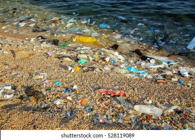 Beach polluted with plastic garbage