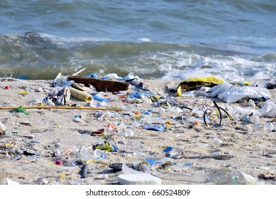 Beach Pollution. Plastic Bottles And Other Trash On Sea Beach