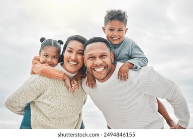 Beach portrait, parents and piggyback for children with family connection, holiday and outdoor bonding. Mom, dad and kids on back by ocean for vacation travel with love, security and care in Mexico - Powered by Shutterstock