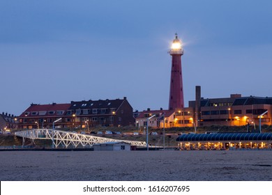 Beach promenade with lighthouse, Scheveningen, The Hague, Holland, The Netherlands