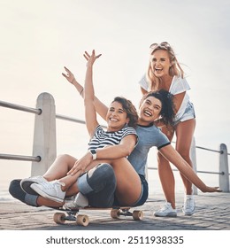 Beach, promenade and women with skateboard, girls and playful with happiness, getaway trip and excited. People, seaside and friends skating, activity and hobby with summer holiday, vacation or travel - Powered by Shutterstock