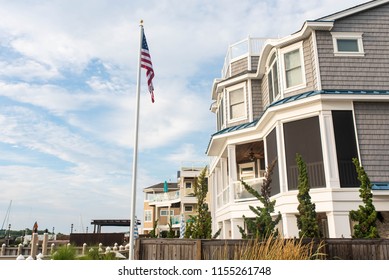 beach property background with American flag waving in the wind taken on Long Beach Island, New Jersey