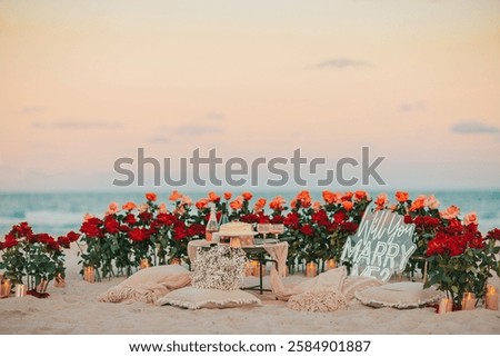 Beach Proposal Decor with Will You Marry Me Sign, Flowers and Cozy Area. Will You Marry Me Proposal. High quality photo