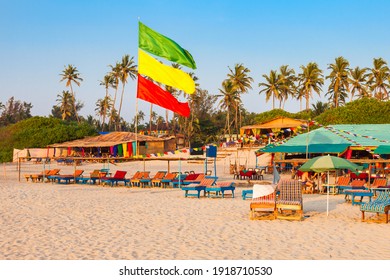 Beach restaurant shacks and sunbeds on Arambol beach in north Goa, India