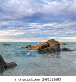 Beach rock formation at Rambak Beach, Bangka Island, Indonesia - Powered by Shutterstock