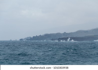 Beach with rocks and breaking waves