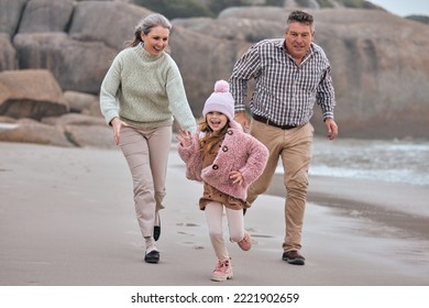 Beach, Running And Family Grandparents With Child Holding Hands For Outdoor Wellness, Energy And Development Holiday. Happy, Excited Girl Or Kid With Her Grandmother And Father Run Together By Sea