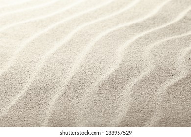 Beach sand as background, close up view