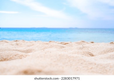 Beach sand background for summer vacation concept. Beach nature and summer seawater with sunlight light sandy beach Sparkling sea water contrast with the blue sky. - Shutterstock ID 2283017971