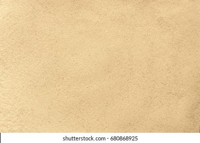 Beach sand as background. Texture of a sandy beach 