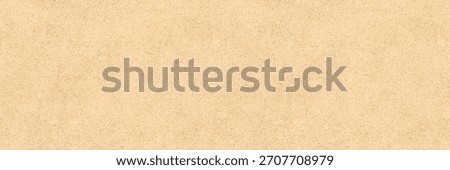 Beach sand background texture – top view of seamless flat sand surface. Brightly lit and sunny. Image is ready to be tiled to create a much larger image or higher resolution background.