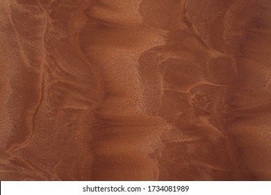 Beach sand, beautiful dark background.