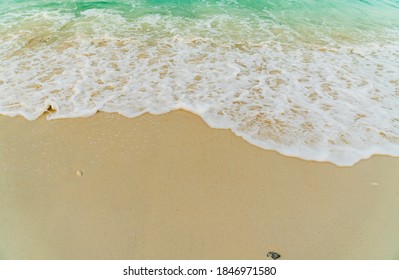 Beach Sand Sea Shore With Blue Wave And White Foamy Summer Background,Aerial Beach Top View Overhead Seaside.