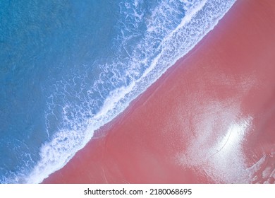 Beach Sand Sea Shore And Waves White Foamy Summer Sunny Day Background.Amazing Beach Top Down View Overhead Seaside Nature Background