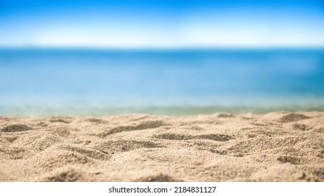 Beach sand sea water summer background. Sand beach desert texture.
				White foam wave sandy seashore .  side view. 