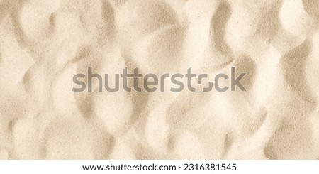 Beach sand texture background. Flat lay, top view, copy space