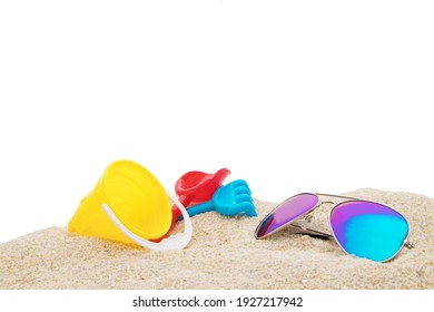 Beach Sand With Toys And Sunglasses Isolated