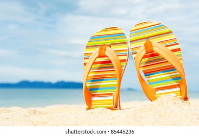 Beach Sandals On The Sandy Coast