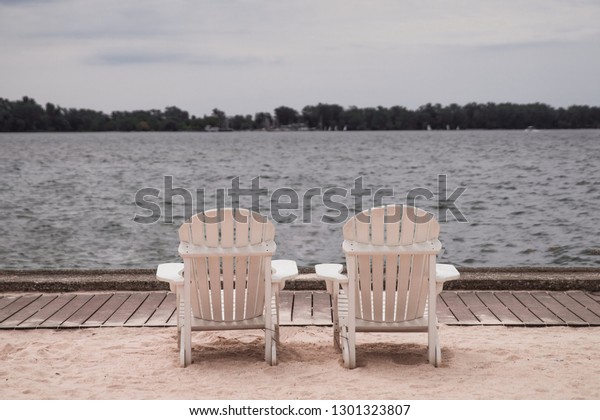 Beach Scene Two Empty Muskoka Chairs Stock Photo Edit Now 1301323807