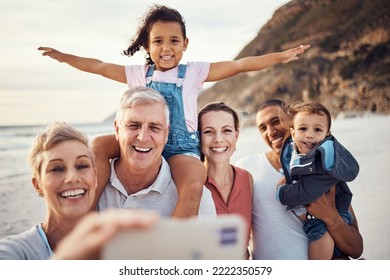 Beach, selfie and happy big family on vacation together in summer by seaside in Australia. Happiness, grandparents and parents with children taking picture with smile on phone while on travel holiday - Powered by Shutterstock