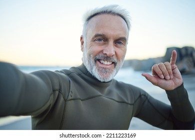 Beach, Selfie And A Happy Elderly Surfer Man At Water On Weekend Morning. Freedom, Ocean And Happiness, Fun On Retirement Surf Holiday In Hawaii. Health, Nature And Senior On Video Call At The Sea.