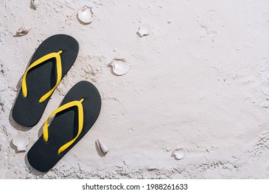 Beach Slippers On The Sand