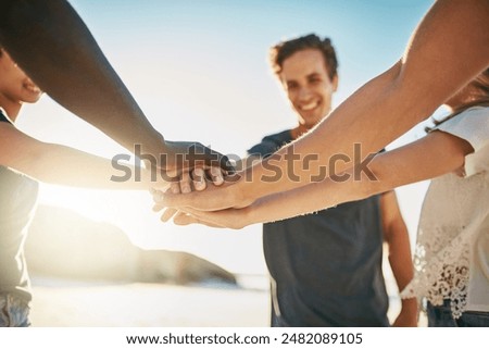 Beach, stack and friends with hands together, summer and travel with support, team building and closeup. Group, seaside and men with women, ocean or cooperation with holiday, getaway trip or break