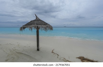 Beach Straw Umbrella From The Sun On The Beach