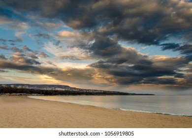 Beach at sunset, Dramatic clouds over the sea