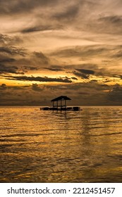 Beach Sunset And Fish Trap House Silhouette