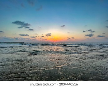 Beach Sunset, Low Wide Angle, Soft Colours. Empty Beach, No People.