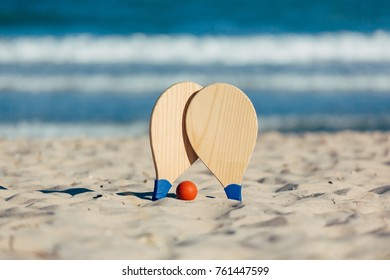 Beach Tennis, Beach Paddle Ball, Matkot. Beach Rackets And Ball On The Beach