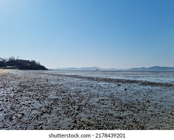 It Is A Beach With Tidal Flats.