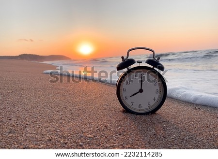 Beach Time, An Old Fashion Alarm Clock on Sandy Beach