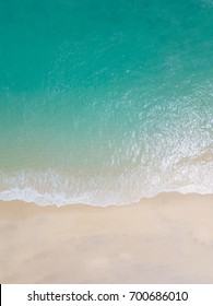 Beach Top View With Wave Foam