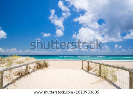 Beach track to Kirra Beach on a beautiful summer day. Gold Coast, Queensland, Australia.