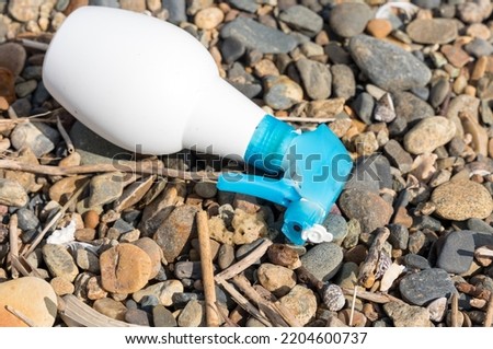 beach trash. coastal flotsam. Image of plastic spray.