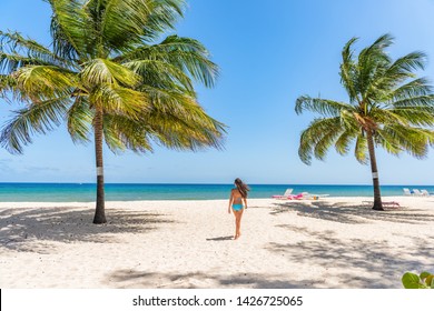 Beach Tropical Vacation In Barbados Caribbean Travel Holiday, Dover Beach Woman Walkingin The Sun In Swimsuit Happy On Beach, Summer Destination. .