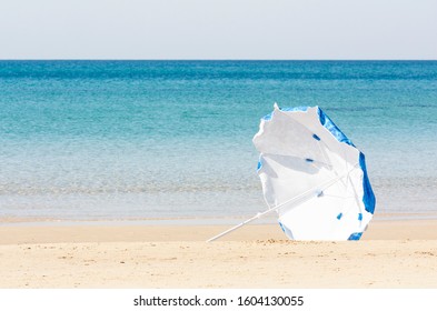 Beach Umbrella Blown Away By The Wind