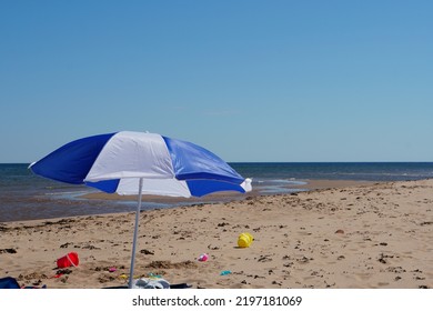 Beach Umbrella Set Up For Family