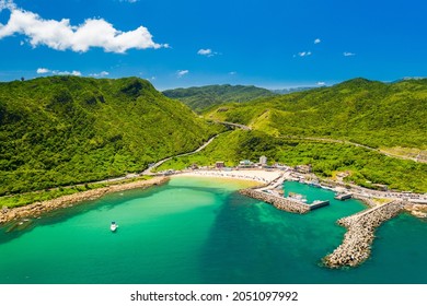 beach vacation in Taiwan summer
				Aerial View of Taiwan beach - Colorful beach use the drone in morning, shot in Dawulun Beach, and Aodi Fishing Harbor, Dawulun, Keelung City, Taiwan. Keelung