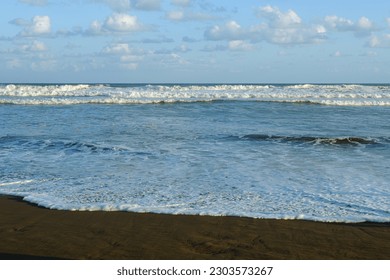 Beach view with cloudy sky